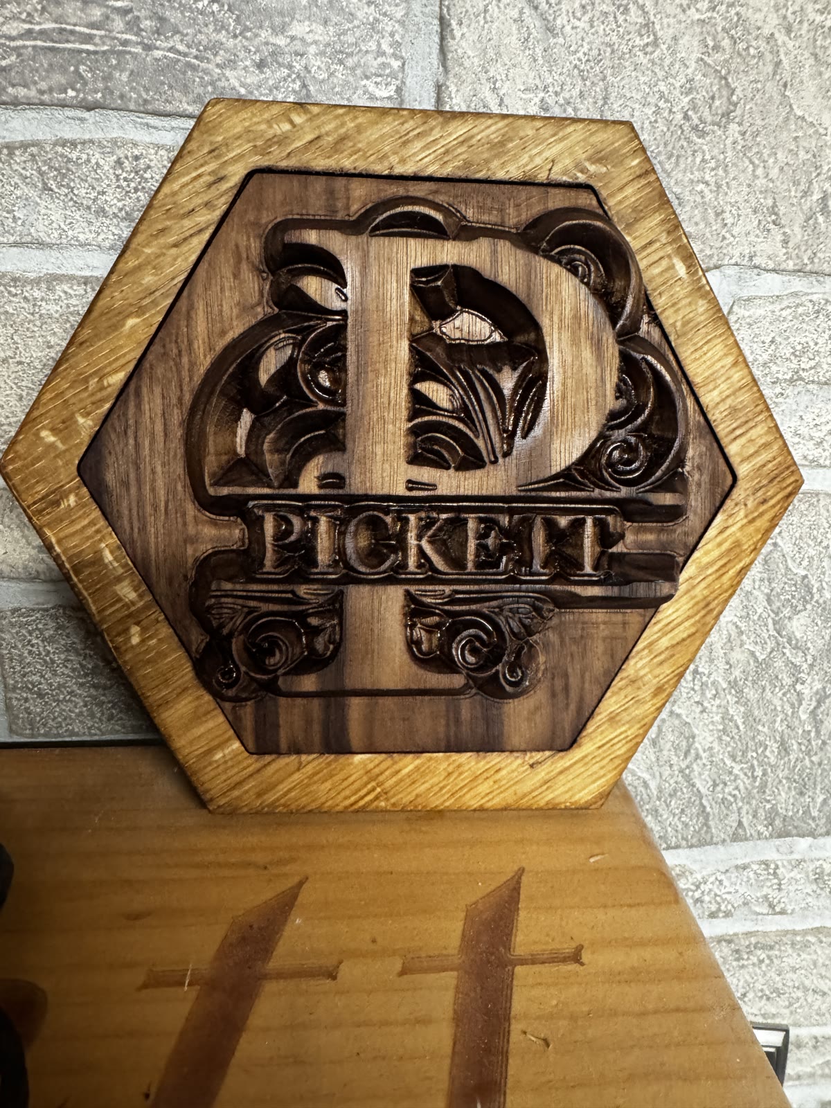 CNC carved scene on hardwood